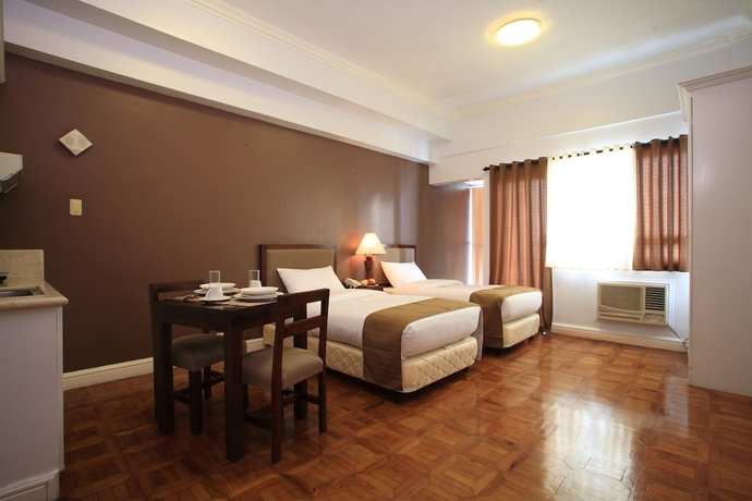 Imagen de la habitación del Hotel Bsa Suites Makati. Foto 5