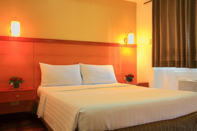 Imagen de la habitación del Hotel Bsa Suites Makati. Foto 7