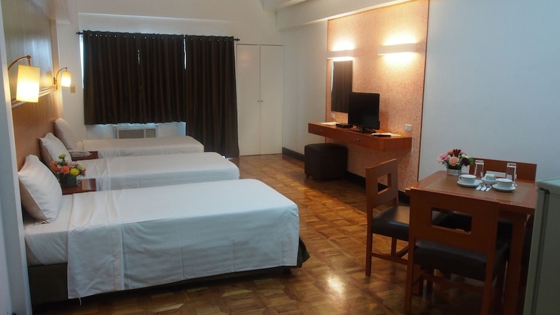 Imagen de la habitación del Hotel Bsa Suites Makati. Foto 8