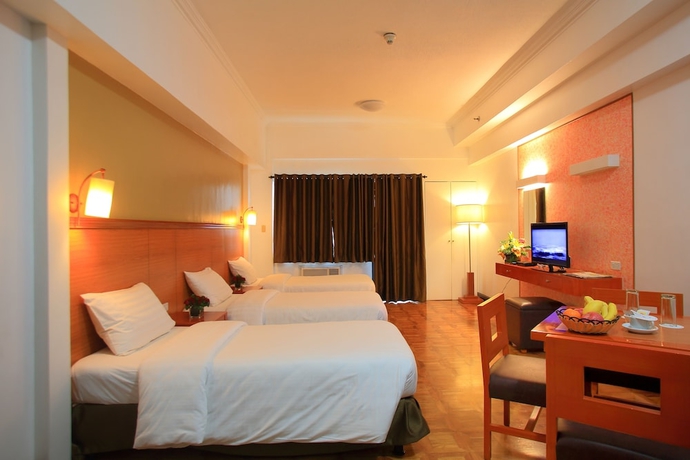 Imagen de la habitación del Hotel Bsa Suites Makati. Foto 9