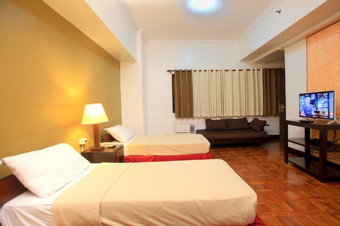 Imagen de la habitación del Hotel Bsa Suites Makati. Foto 10