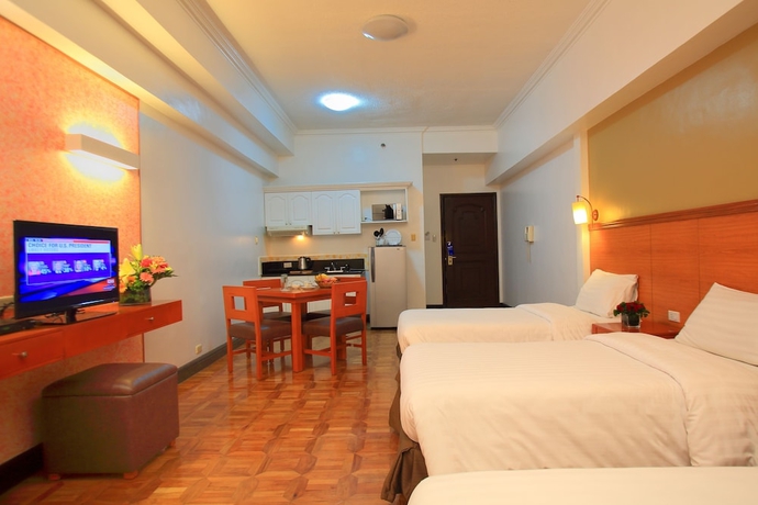 Imagen de la habitación del Hotel Bsa Suites Makati. Foto 11
