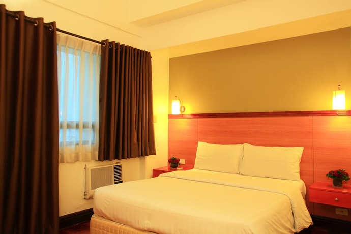Imagen de la habitación del Hotel Bsa Suites Makati. Foto 12