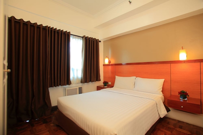 Imagen de la habitación del Hotel Bsa Suites Makati. Foto 13