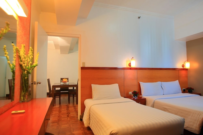 Imagen de la habitación del Hotel Bsa Suites Makati. Foto 15