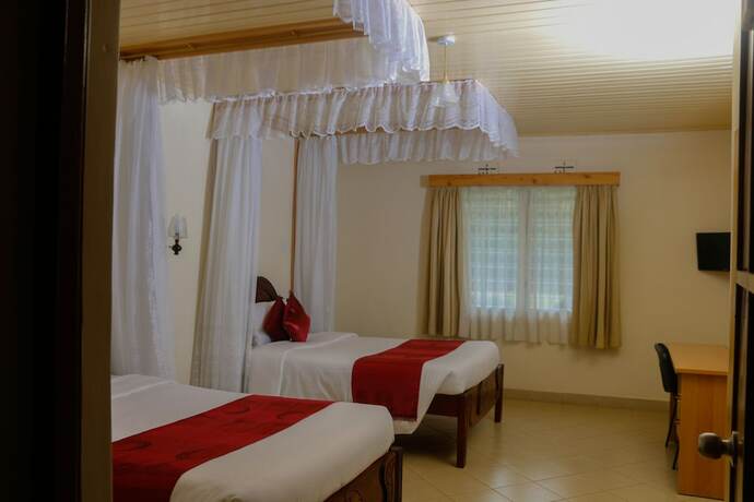 Imagen de la habitación del Hotel Btl Christian International Conference Centre. Foto 17