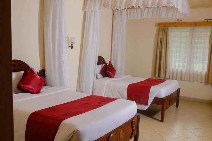 Imagen de la habitación del Hotel Btl Christian International Conference Centre. Foto 19