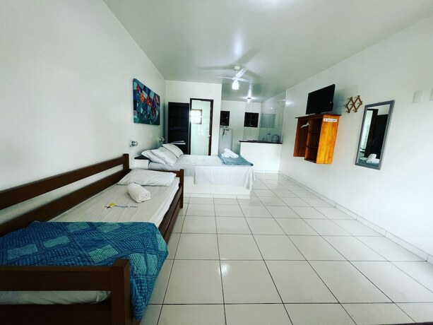 Imagen de la habitación del Hotel B&uacute;zios Flat Pousada. Foto 14