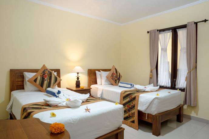Imagen de la habitación del Hotel Buana Homestay. Foto 3