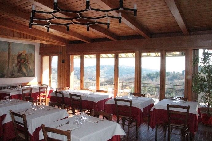Imagen del bar/restaurante del Hotel Buca Di Michelangelo. Foto 5