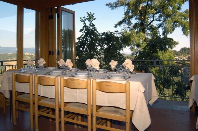 Imagen del bar/restaurante del Hotel Buca Di Michelangelo. Foto 7