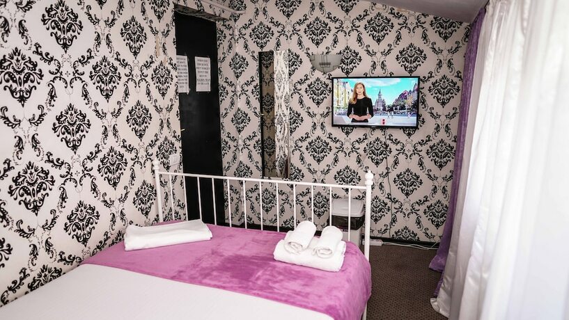Imagen de la habitación del Hotel Bucharest Center Villa. Foto 17