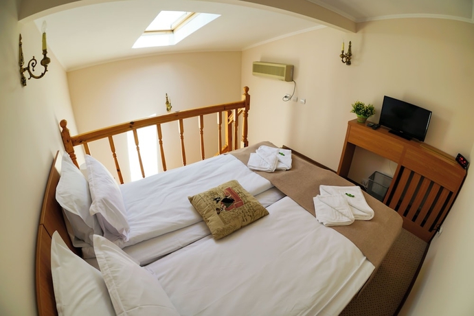 Imagen de la habitación del Hotel Bucharest Downtown Inn. Foto 9