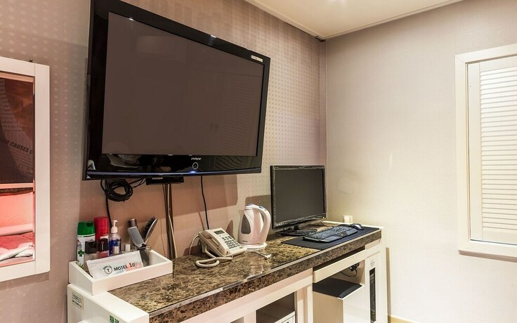 Imagen de la habitación del Hotel Bucheon Alps. Foto 34