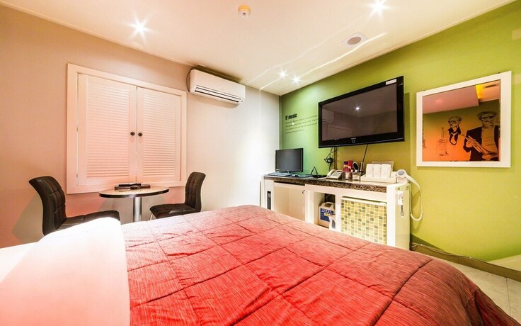 Imagen de la habitación del Hotel Bucheon Alps. Foto 36
