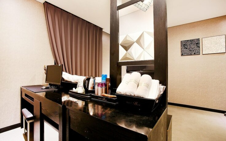Imagen de la habitación del Hotel Bucheon Seattle. Foto 23