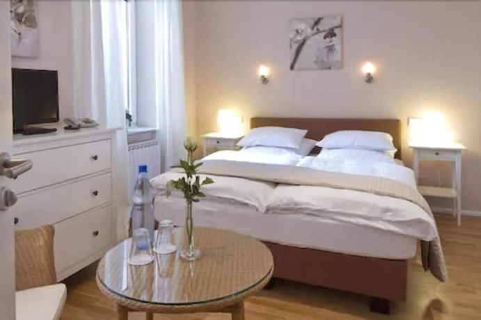 Imagen de la habitación del Hotel Buchholz Downtown. Foto 13