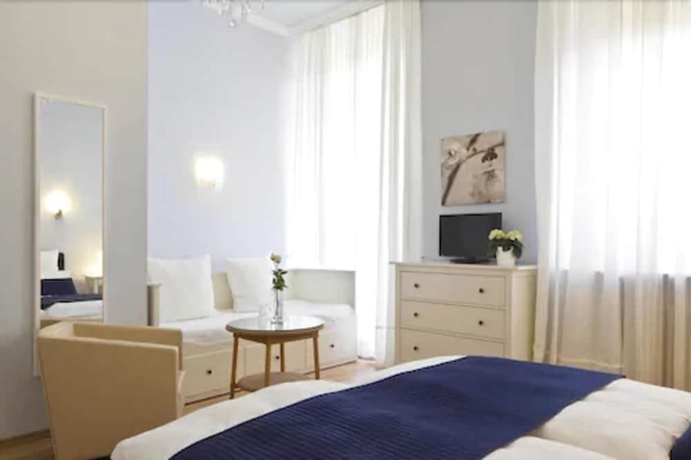 Imagen de la habitación del Hotel Buchholz Downtown. Foto 15