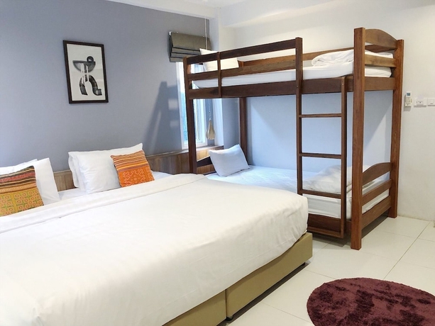 Imagen de la habitación del Hotel Buchita Nimman. Foto 7