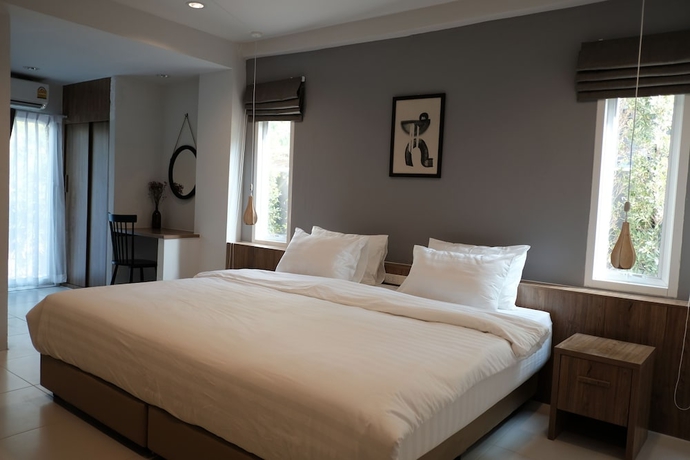 Imagen de la habitación del Hotel Buchita Nimman. Foto 10