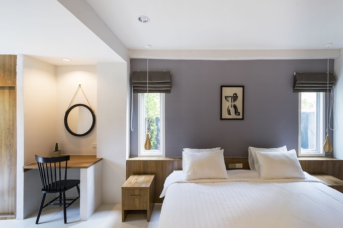 Imagen de la habitación del Hotel Buchita Nimman. Foto 11