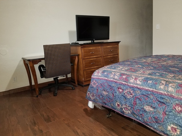 Imagen de la habitación del Hotel Buckboard Motel. Foto 13