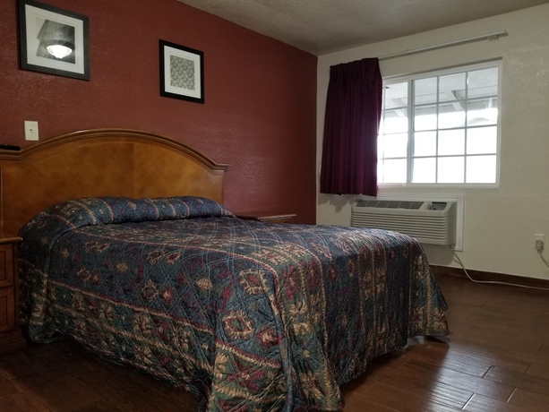 Imagen de la habitación del Hotel Buckboard Motel. Foto 14