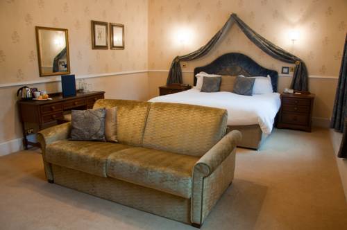 Imagen de la habitación del Hotel Buckland Tout Saints. Foto 4