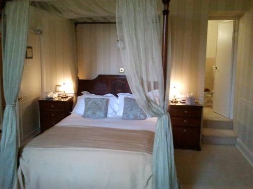 Imagen de la habitación del Hotel Buckland Tout Saints. Foto 14