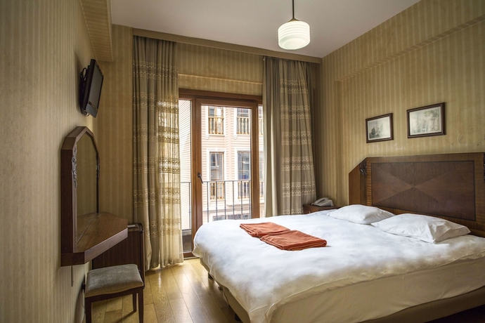 Imagen de la habitación del Hotel Bucoleon By Cheers. Foto 2