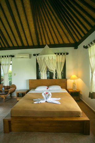 Imagen de la habitación del Hotel Bucu Beji Ubud. Foto 16