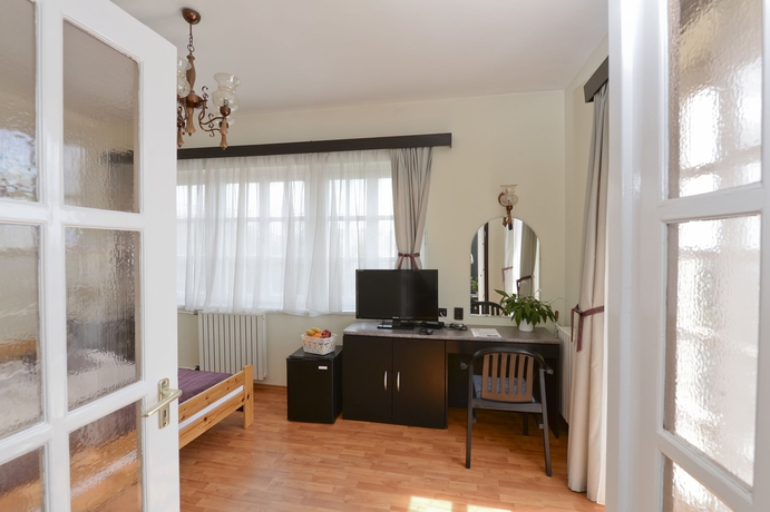 Imagen de la habitación del Hotel Budai Hotel. Foto 4