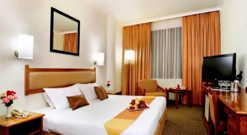 Imagen de la habitación del Hotel Buddha International. Foto 10