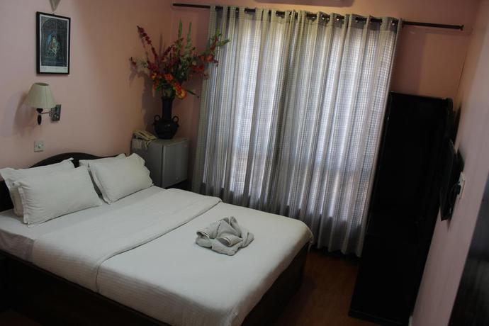 Imagen de la habitación del Hotel Buddha Land. Foto 5