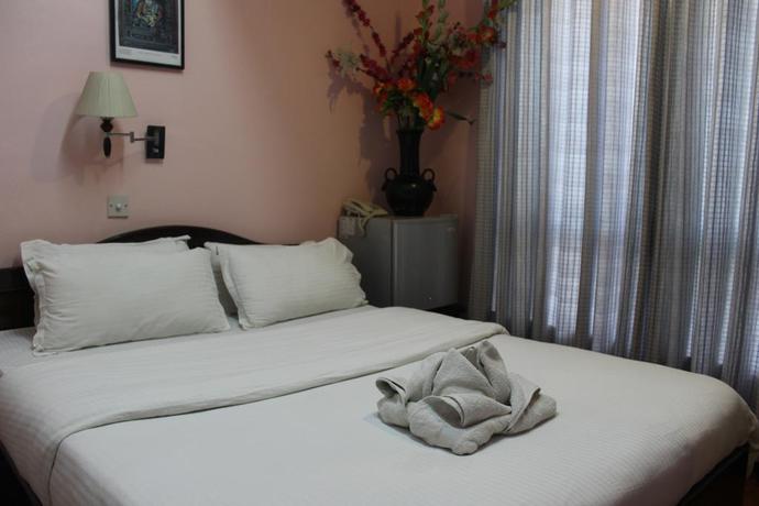 Imagen de la habitación del Hotel Buddha Land. Foto 8