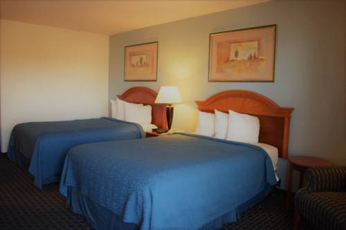 Imagen de la habitación del Hotel Budget Host. Foto 3