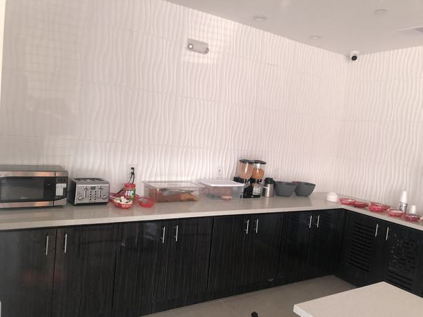 Imagen del bar/restaurante del Hotel Budget Host Inn and Suites. Foto 6