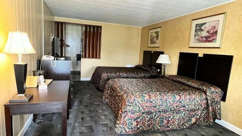 Imagen de la habitación del Hotel Budget Host Mel-Dor Motel. Foto 12
