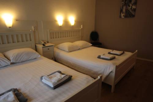 Imagen de la habitación del Hotel Budget Hotel Barbacan. Foto 9