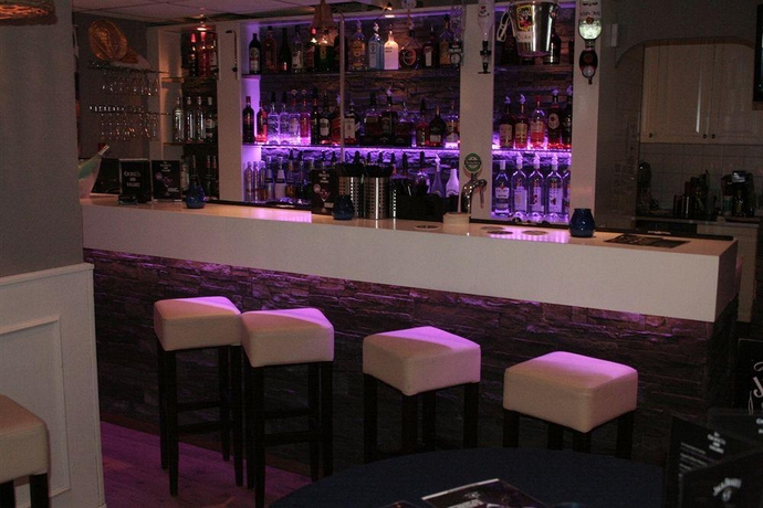 Imagen del bar/restaurante del Hotel Budget Hotel Barbacan. Foto 2