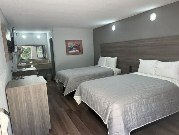 Imagen de la habitación del Hotel Budget Inn Express, Columbia. Foto 6