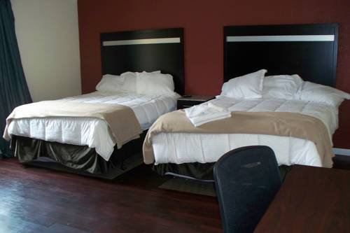Imagen de la habitación del Hotel Budget Inn and Suites, Wall Township. Foto 4