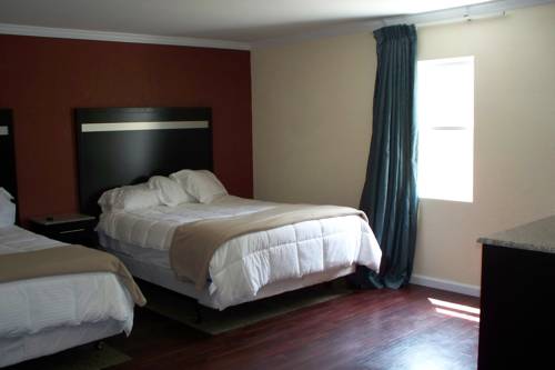 Imagen de la habitación del Hotel Budget Inn and Suites, Wall Township. Foto 11