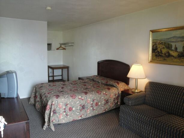 Imagen de la habitación del Hotel Budget Motel. Foto 10