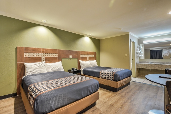 Imagen de la habitación del Hotel Budgetel Inn and Suites Raleigh Downtown East. Foto 4