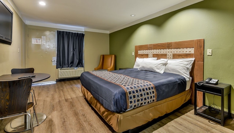 Imagen de la habitación del Hotel Budgetel Inn and Suites Raleigh Downtown East. Foto 8