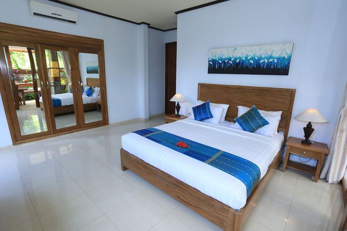 Imagen de la habitación del Hotel Budhi Ayu Villas and Cottages Ubud. Foto 5