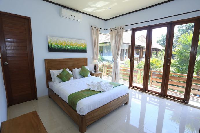Imagen de la habitación del Hotel Budhi Ayu Villas and Cottages Ubud. Foto 7
