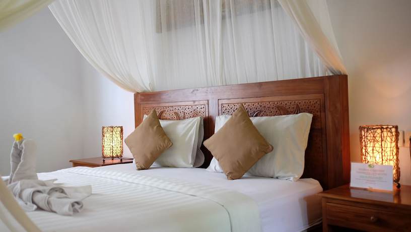 Imagen de la habitación del Hotel Budhi Ayu Villas and Cottages Ubud. Foto 8
