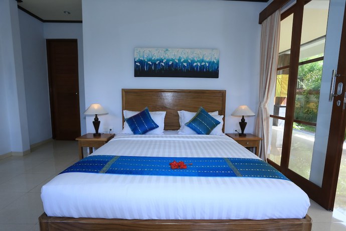 Imagen de la habitación del Hotel Budhi Ayu Villas and Cottages Ubud. Foto 9